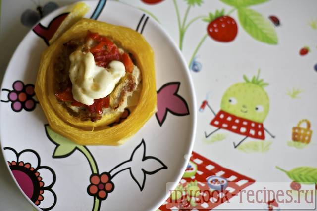 The vegetable marrows stuffed with meat and tomatoes